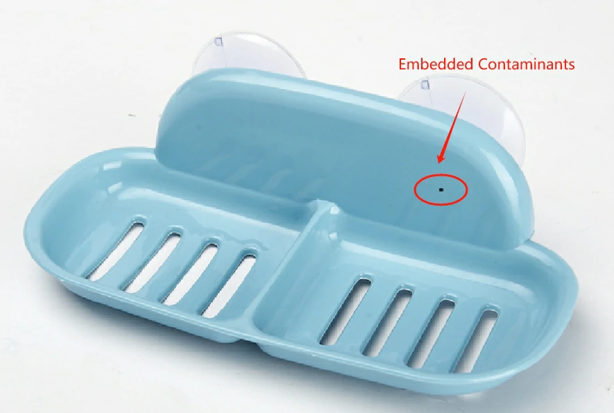 injection molding defects-embedded contaminants